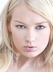 Pale skinned erotic teen babe Tabitha showing curvy body