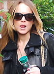 Lindsay Lohan leggings and boots combo